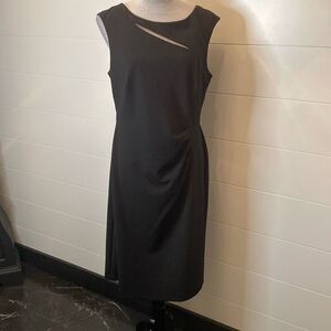 Connected sleeveless black dress